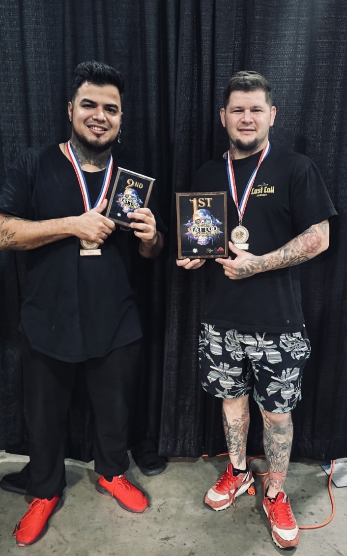 Suicida Ink artists with first and second place tattoo awards