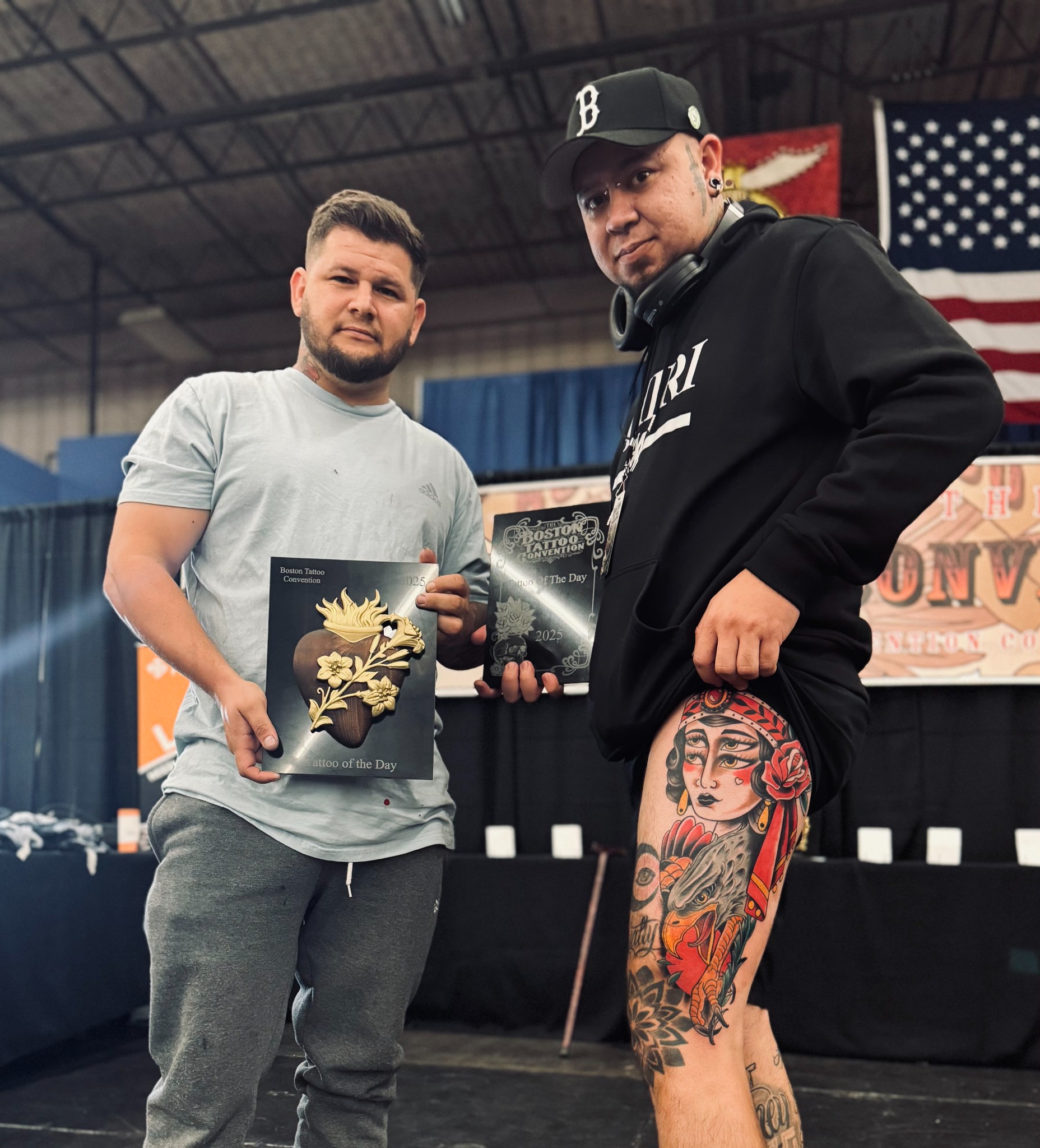 Boston Tattoo Convention Tattoo of the Day award with colorful leg tattoo